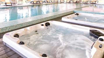 Indoor pool, open 8:00 AM to 8:30 PM, pool loungers