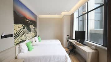 Pillow-top beds, desk, laptop workspace, blackout curtains