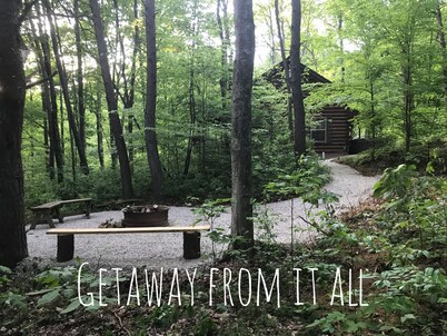 Rustic Cabin Getaway with Hot Tub, Trails & Fire Pit