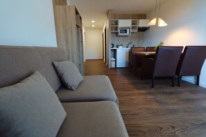 Premium Apartment, Balcony, Partial Lake View | In-room dining - Residence ŠÍRAVA (Kaluža)