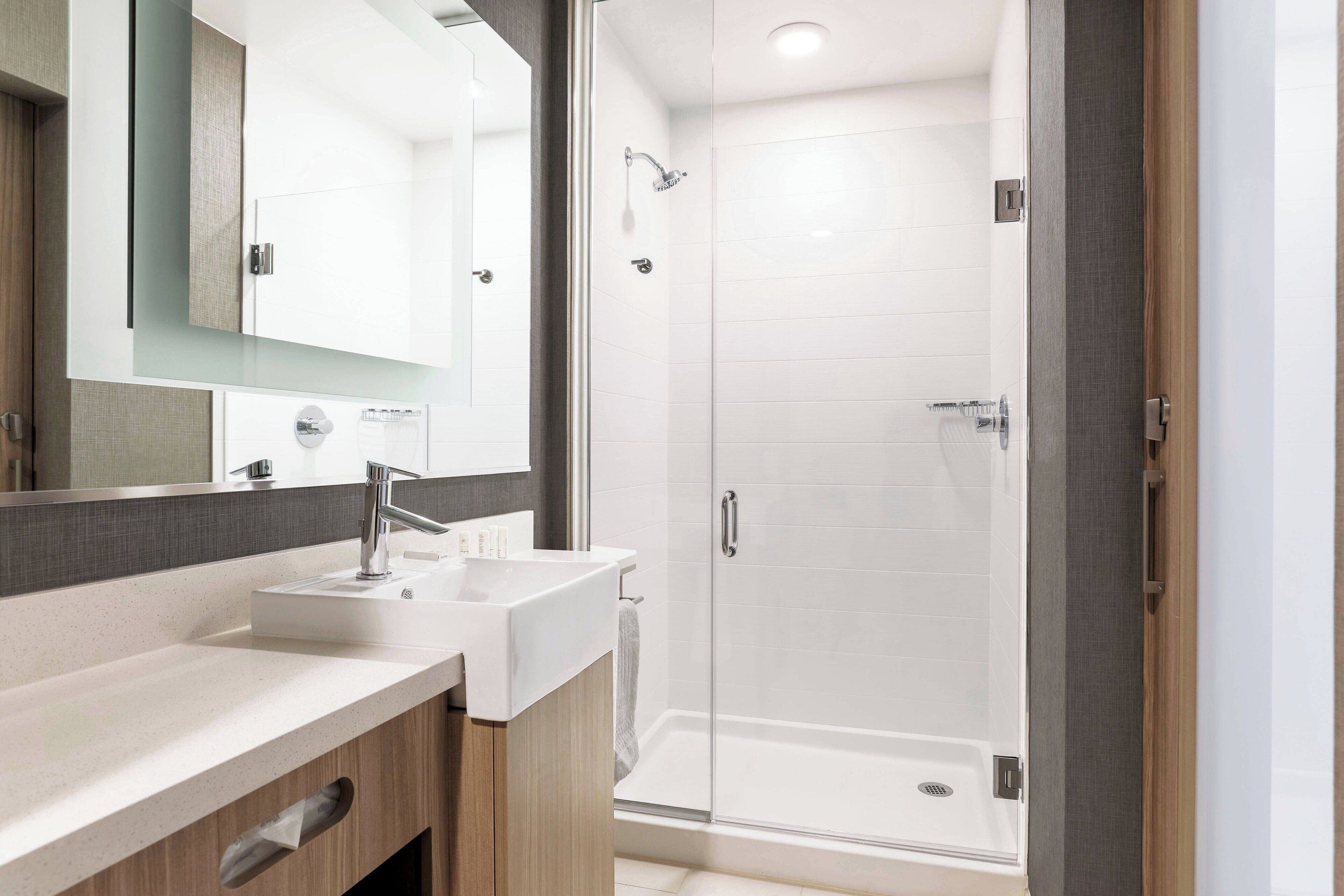 shower, free toiletries, hair dryer, towels