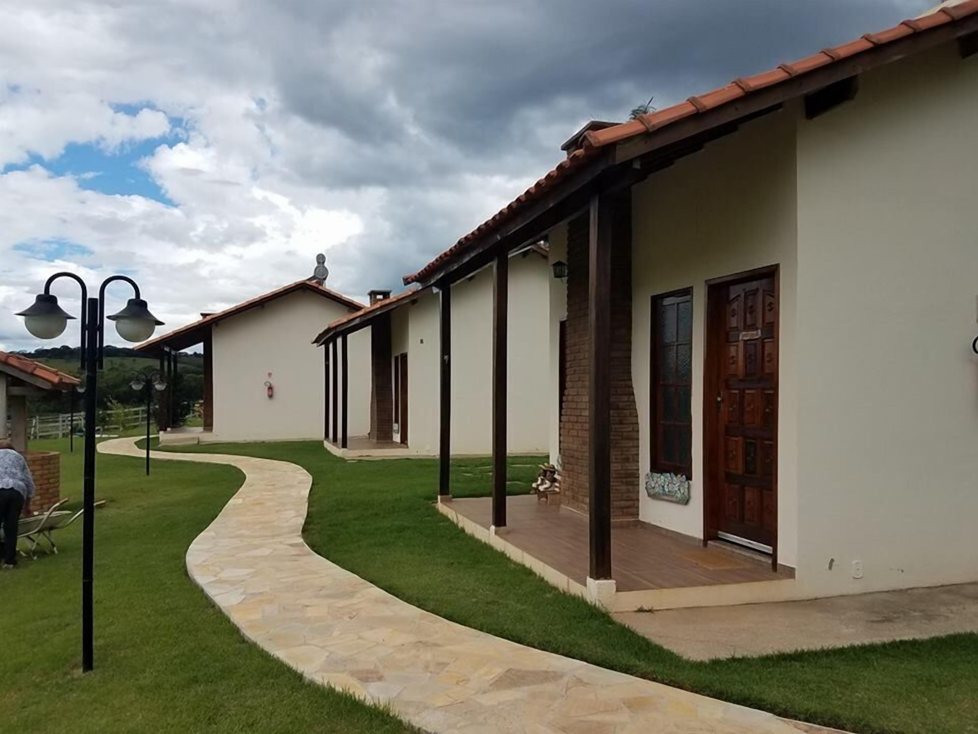 A row of houses with a stone pathway leading to the entrance.