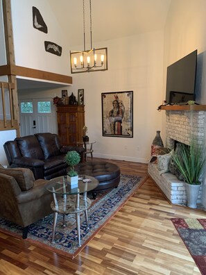 Smart TV, fireplace, DVD player, books