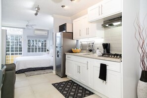 Fridge, microwave, stovetop, coffee/tea maker