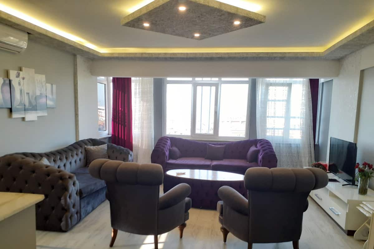 Apartment 2 Bedroom | Living room | 43-inch Smart TV with satellite channels, TV, MP3 dock