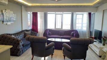 Apartment 2 Bedroom | Living room | 43-inch Smart TV with satellite channels, TV, MP3 dock