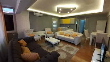 Connected 3 Bedroom Apartment | Living room | 43-inch Smart TV with satellite channels, TV, MP3 dock