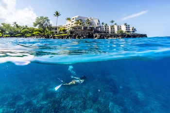 Surfing/boogie boarding at OUTRIGGER Kona Resort & Spa