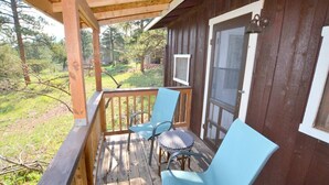 A wooden porch with a railing, two chairs, and a small table. - Little Mosser-Awesome Views! Very Quiet! (Estes Park)