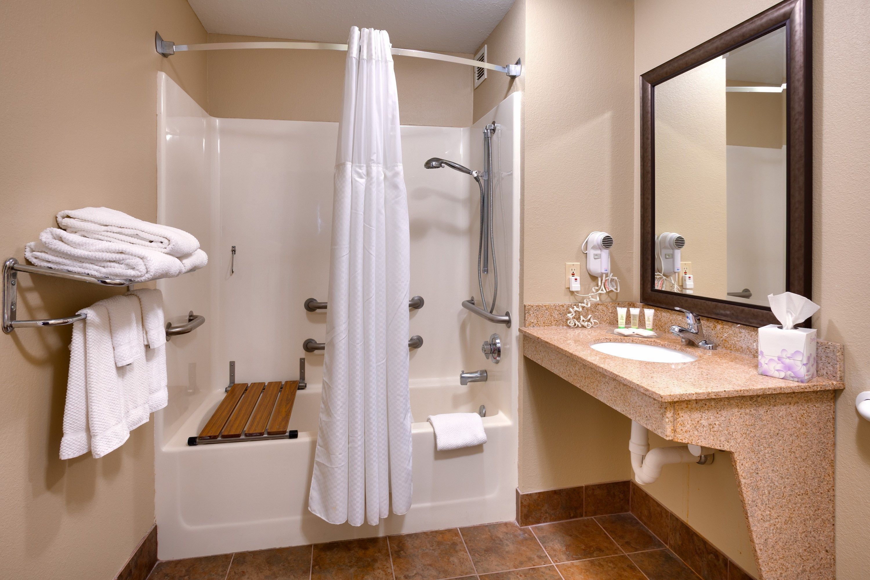 Hair dryer, towels, soap, shampoo