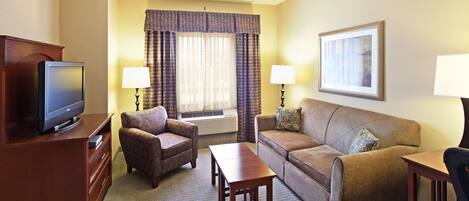 Televisión, reproductor de DVD y oficina