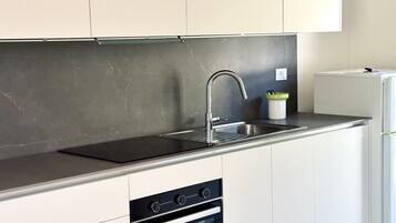Fridge, oven, dining tables
