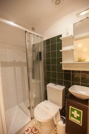 Shower, free toiletries, hair dryer, towels