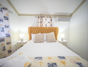 1 slaapkamer, een strijkplank/strijkijzer, internet, beddengoed