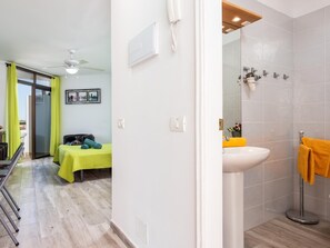 Bathtub, hair dryer, towels