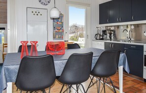 Fridge, stovetop, dishwasher, coffee/tea maker