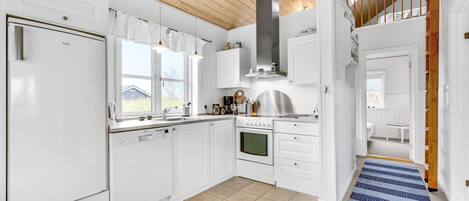 Fridge, stovetop, coffee/tea maker