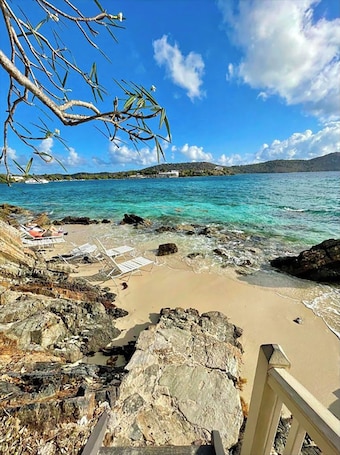 On the beach, sun loungers, beach towels. Villa Sea Song - Waterfront - Private Unobstructed views!