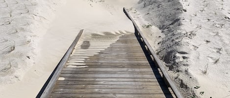 On the beach, sun-loungers