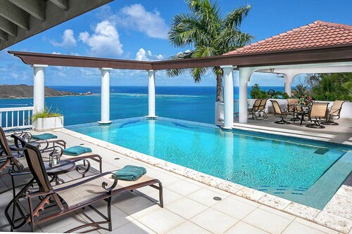 Elegance and Island Charm Greet You At This Beautiful Rental Villa