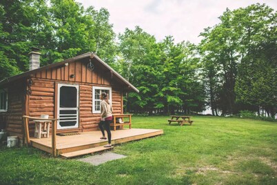 Cabin on lake with sauna - pets ok. Kayaks and boat provided.