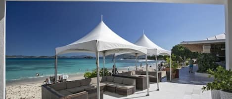 On the beach, sun-loungers, beach towels