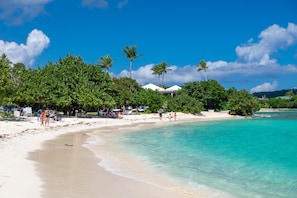 On the beach, sun loungers, beach towels
