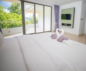 Appartement panoramique, 2 chambres, piscine privée, vue sur l’océan (404) | Literie de qualité, coffre-fort, rideaux d’obscurcissement