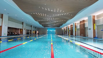 Indoor pool, seasonal outdoor pool, pool umbrellas, sun loungers