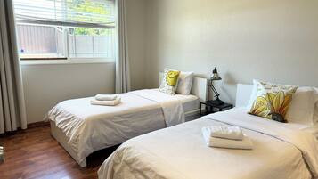 3 dormitorios, tabla de planchar con plancha, wifi gratis y ropa de cama