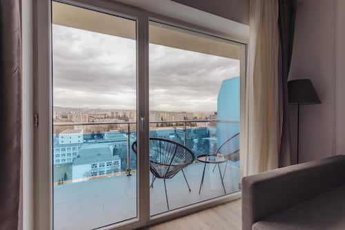 Panoramic-Apartment | Blick auf die Stadt
