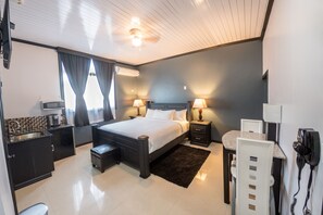 Deluxe Room, 1 King Bed | In-room safe, desk, blackout drapes, iron/ironing board