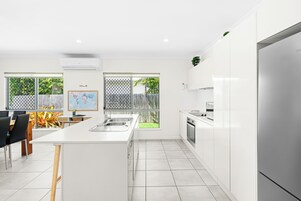 Luxury Villa | Private kitchen | Full-size fridge, microwave, oven, stovetop