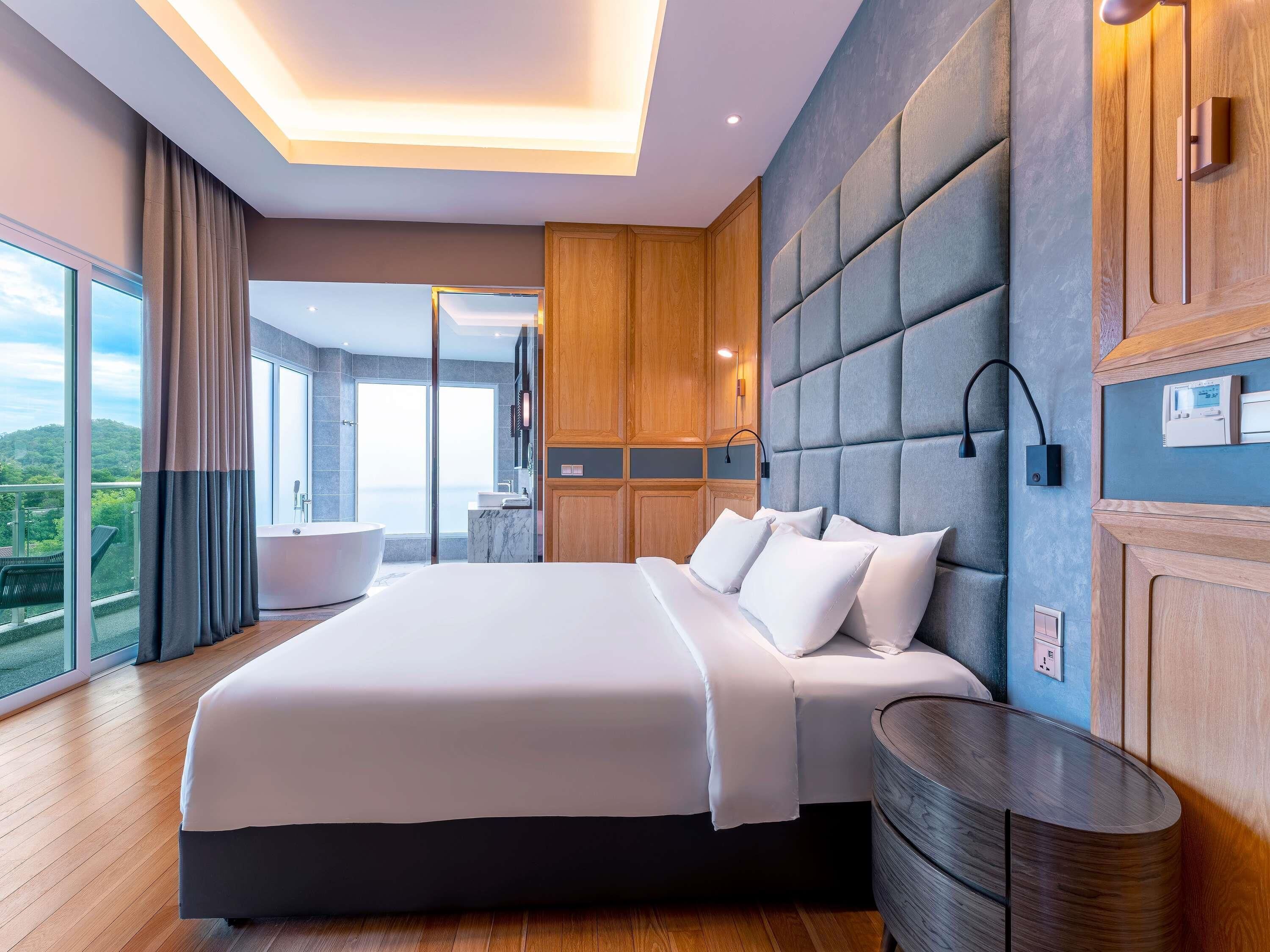 Edredón, camas Select Comfort y minibar 