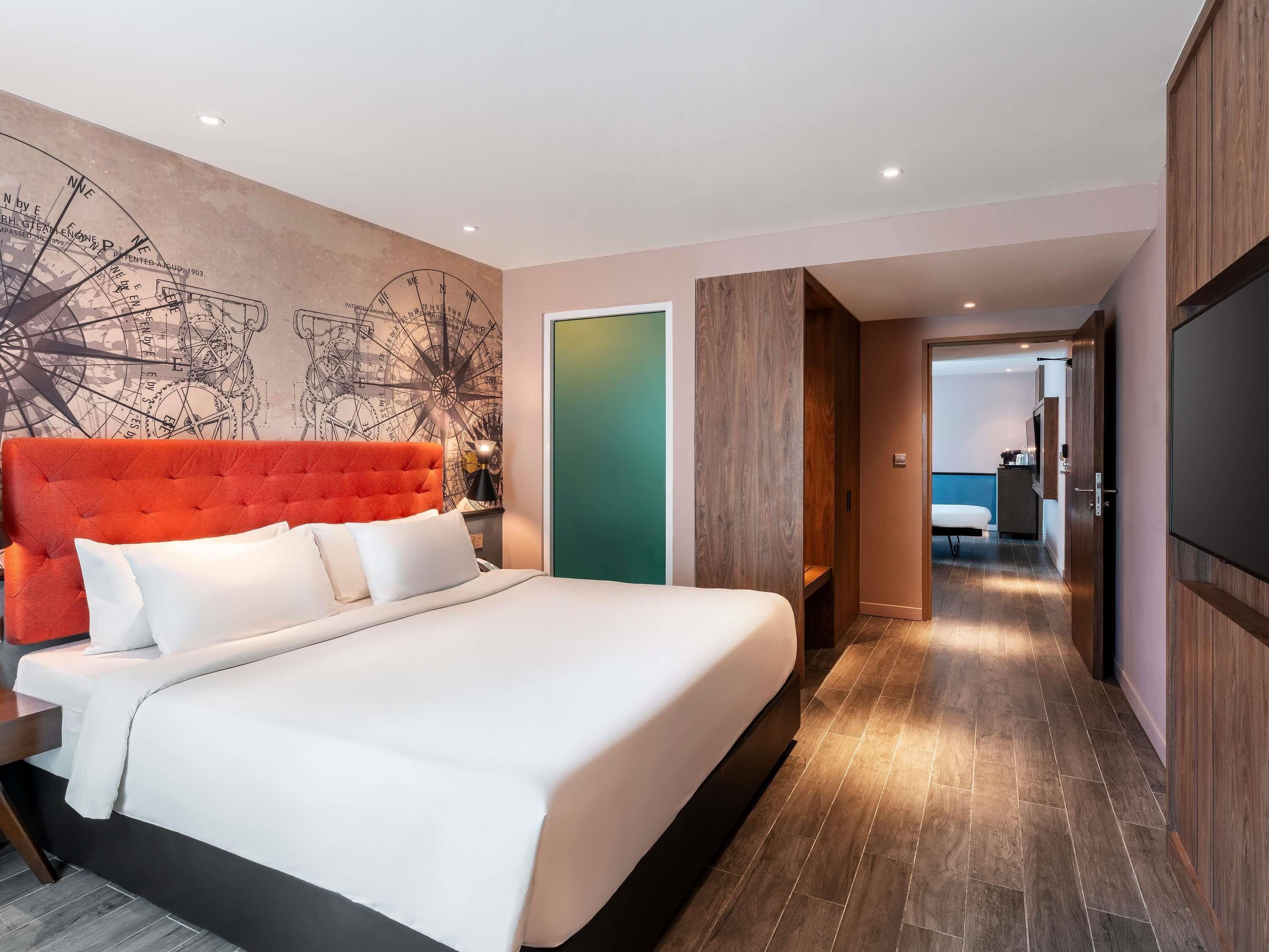 Phòng đôi Deluxe, nhiều giường | Chăn bông, nệm Select Comfort, minibar, két bảo mật tại phòng 