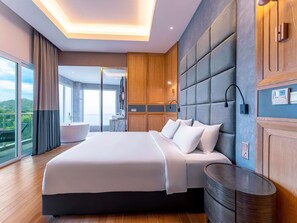 Edredón, camas Select Comfort y minibar 