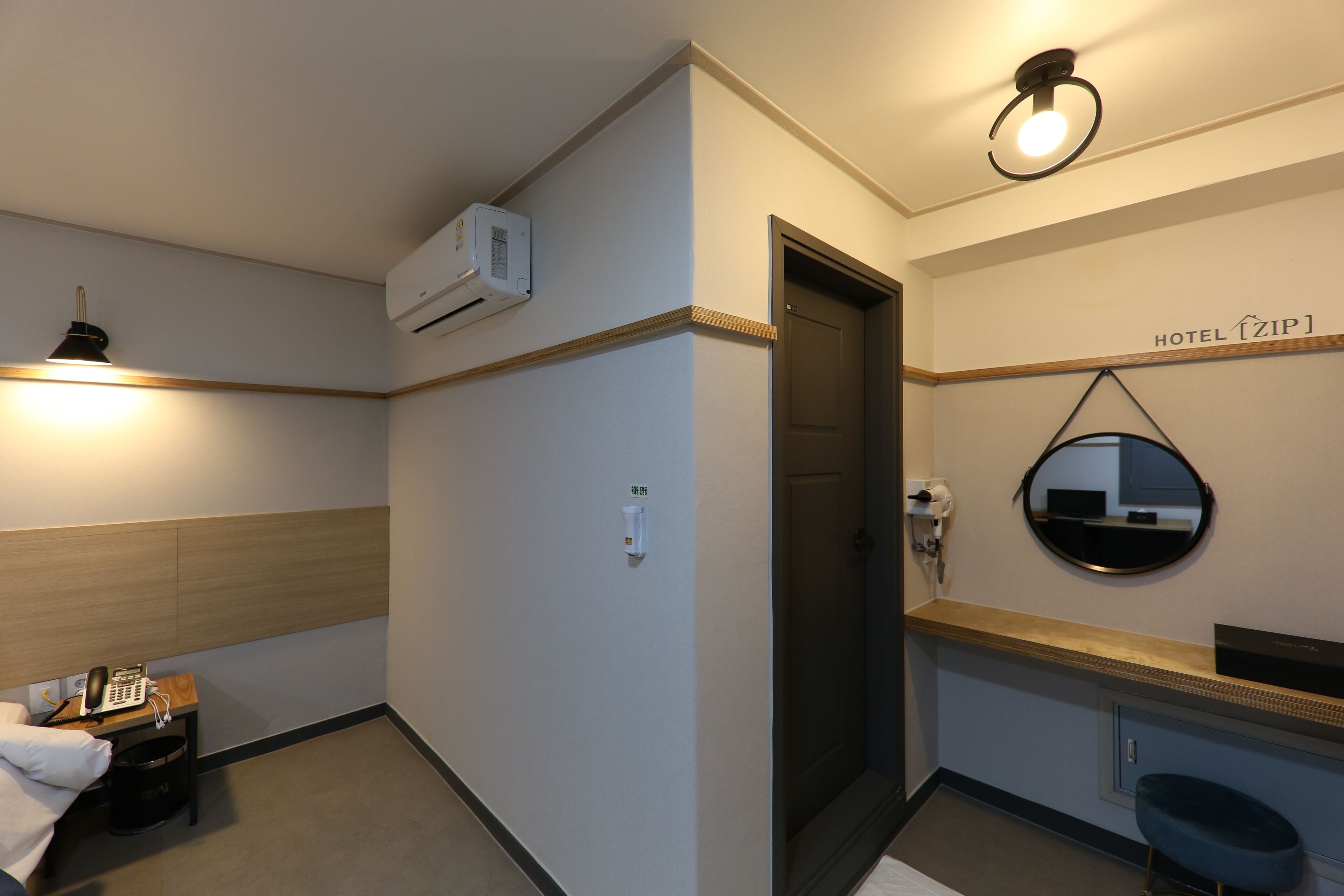 family room | bathroom amenities | shower, rainfall showerhead, designer toiletries, hair dryer