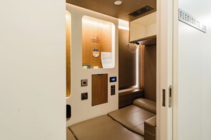 Laptop workspace, bed sheets