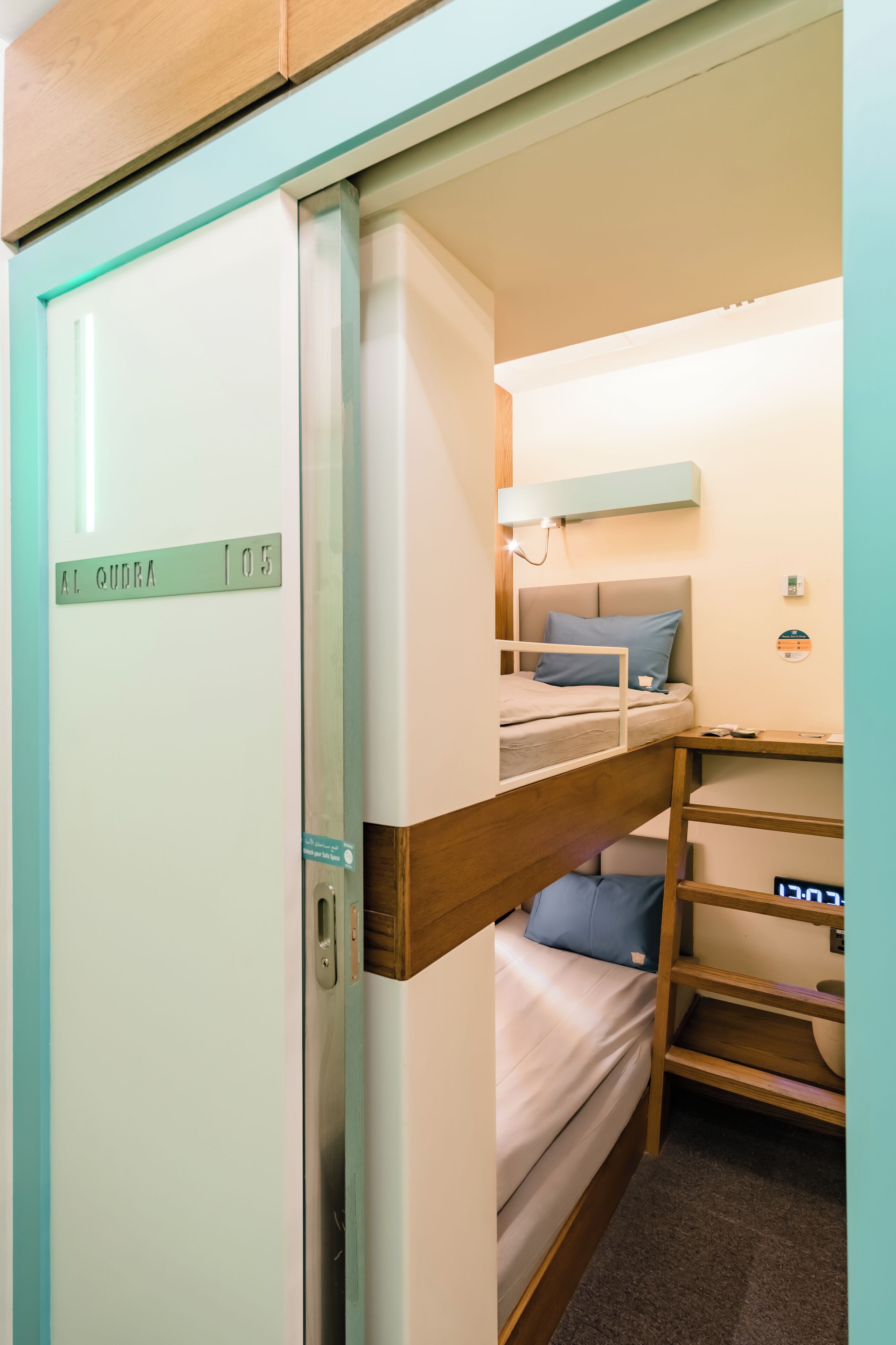 Laptop workspace, bed sheets