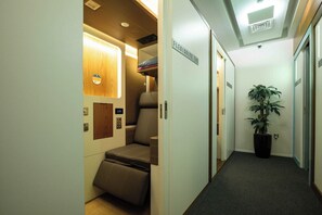 Laptop workspace, bed sheets