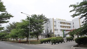 A modern building with a sign reading "CHINA HOTEL". - Channel View Hotel (Calabar)
