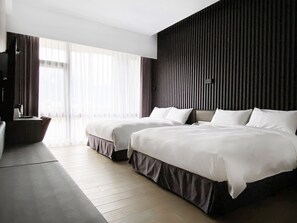 A modern hotel room with two beds, a large window with sheer curtains, and a dark textured wall. - Champ de Roses Hotel (Hualien City)