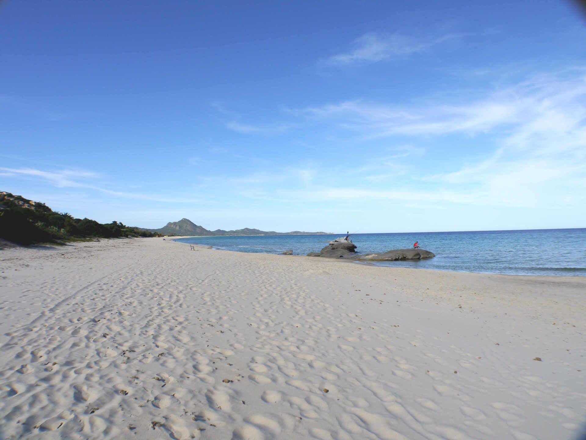 On the beach, sun loungers
