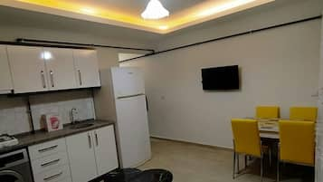 Apartment, 1 Bedroom | Living room | LCD TV