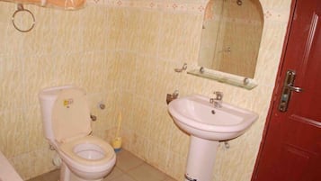 Double Room | Bathroom | Shower, free toiletries, towels, soap