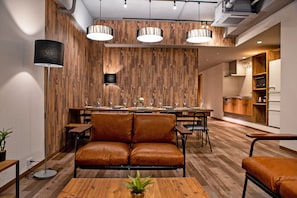 Apartment, 3 Bedrooms | Living area | 65-inch flat-screen TV with digital channels, TV