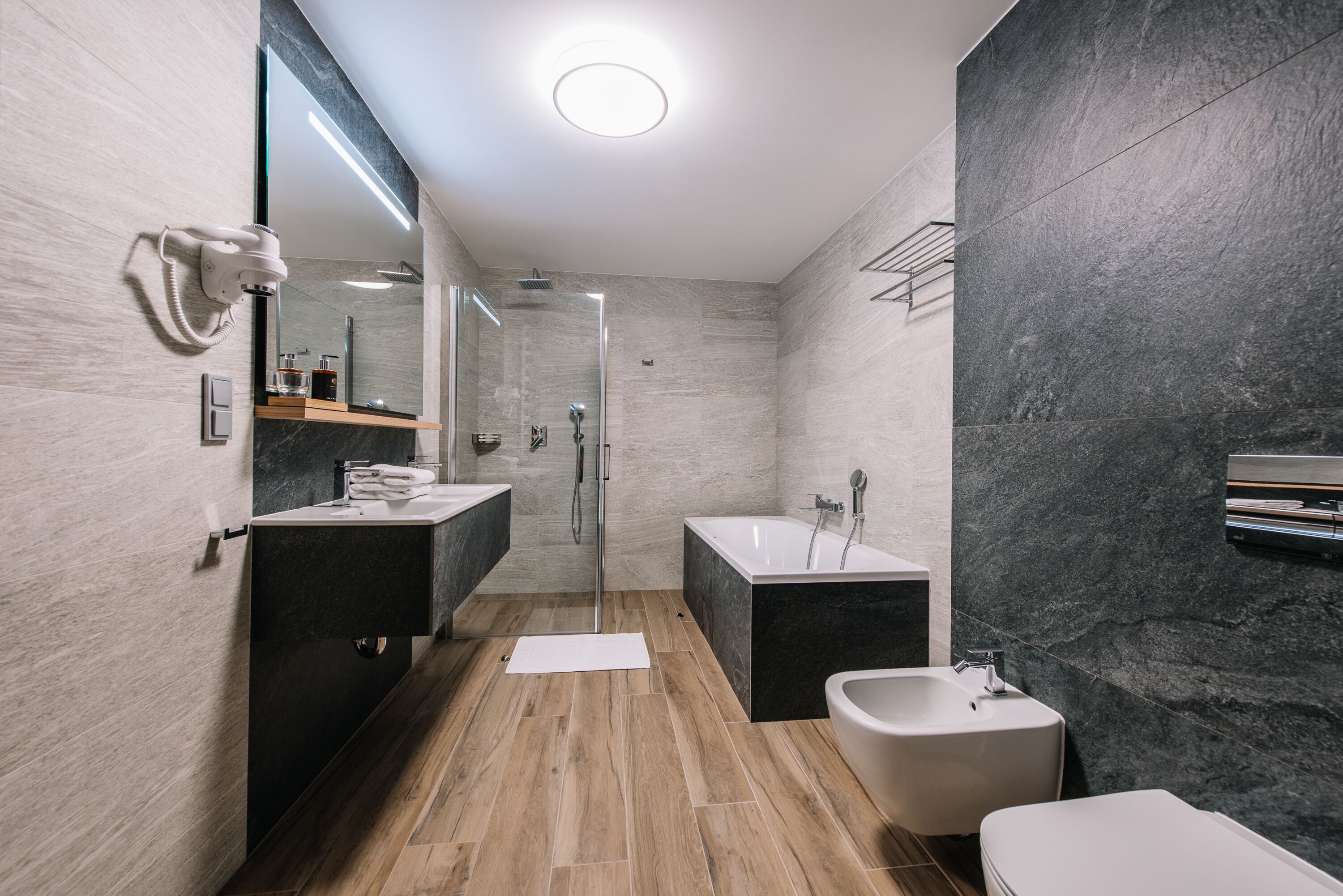 family room | bathroom | hair dryer, towels, soap, shampoo