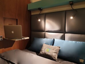 Espacio para trabajar con laptop, wifi gratis y ropa de cama 