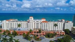 A large hotel with multiple floors, a central tower, and a view of the ocean. - 661 Partial Ocean View Hollywood Beach (Hollywood)
