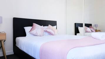 2 bedrooms, laptop workspace, iron/ironing board, bed sheets